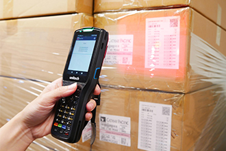 The Unitech HT380 in a Warehouse